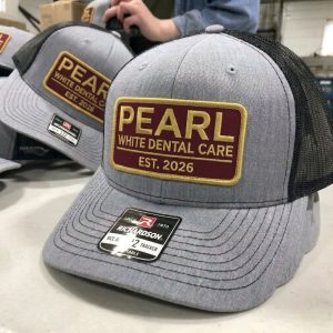 Custom Embroidered Patches on Trucker Hats for Dental Offices